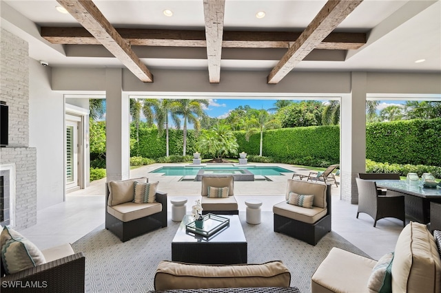 745 Riviera Dr, Naples, FL 34103 - view of patio featuring an outdoor hangout area and a pool with connected hot tub