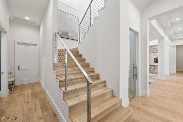 745 Riviera Dr, Naples, FL 34103 - stairs with wood-type flooring and recessed lighting