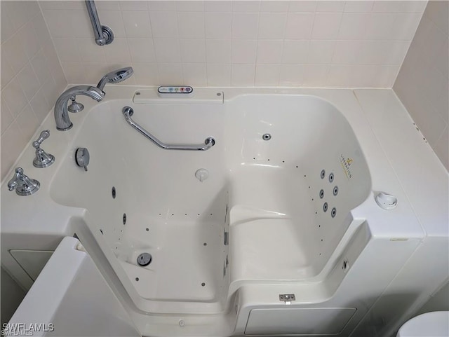 1915 Courtyard Way Unit G102, Naples, FL 34112 - bathroom view of a jetted tub