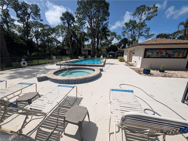 1915 Courtyard Way Unit G102, Naples, FL 34112 - community pool featuring a hot tub and a patio area