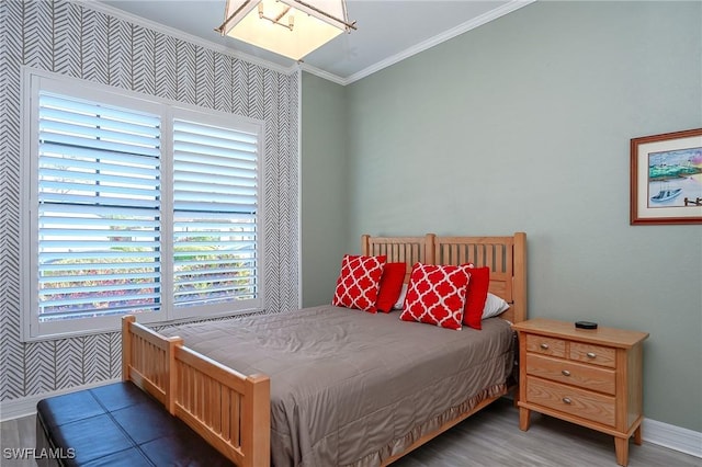 2110 Antigua Ln, Naples, FL 34120 - bedroom featuring ornamental molding and wood finished floors