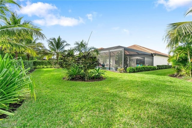 2110 Antigua Ln, Naples, FL 34120 - view of grassy yard featuring glass enclosure