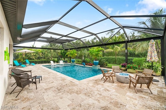 2110 Antigua Ln, Naples, FL 34120 - outdoor pool with an outdoor fire pit, a patio, and a lanai