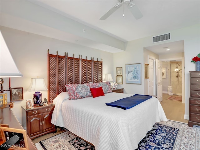1001 Arbor Lake Dr Unit 1102, Naples, FL 34110 - bedroom featuring connected bathroom and a ceiling fan