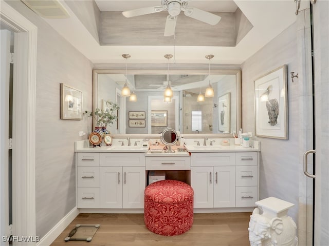 1001 Arbor Lake Dr Unit 1102, Naples, FL 34110 - full bathroom featuring a ceiling fan, wood finished floors, and vanity