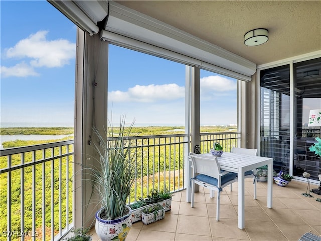 1001 Arbor Lake Dr Unit 1102, Naples, FL 34110 - sunroom with a water view