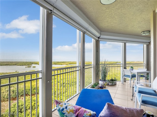 1001 Arbor Lake Dr Unit 1102, Naples, FL 34110 - sunroom / solarium featuring a water view