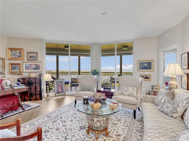 1001 Arbor Lake Dr Unit 1102, Naples, FL 34110 - living area with wood finished floors