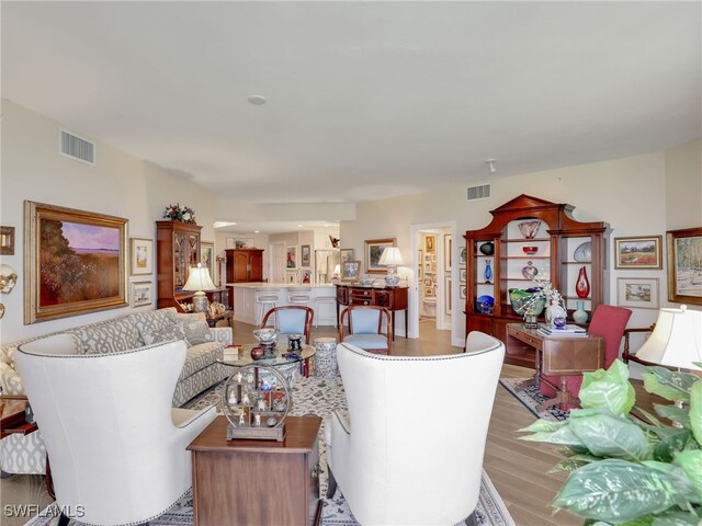 1001 Arbor Lake Dr Unit 1102, Naples, FL 34110 - living area featuring light wood-type flooring