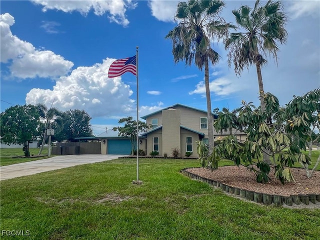 195 E Mariana Ave, North Fort Myers, FL 33917 - view of front of property featuring driveway, a front lawn, and a garage