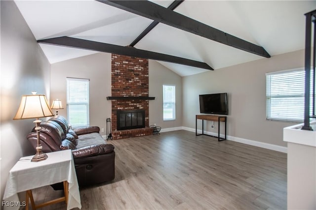 195 E Mariana Ave, North Fort Myers, FL 33917 - living room with wood finished floors and a fireplace