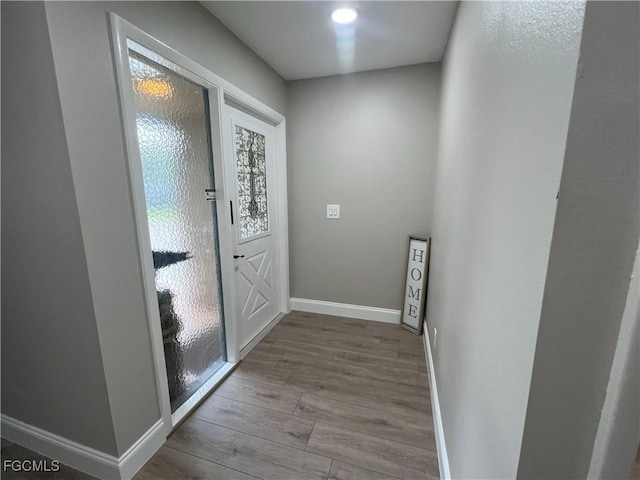 195 E Mariana Ave, North Fort Myers, FL 33917 - entryway with wood finished floors and baseboards