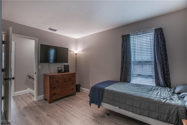 195 E Mariana Ave, North Fort Myers, FL 33917 - bedroom with light wood finished floors and baseboards
