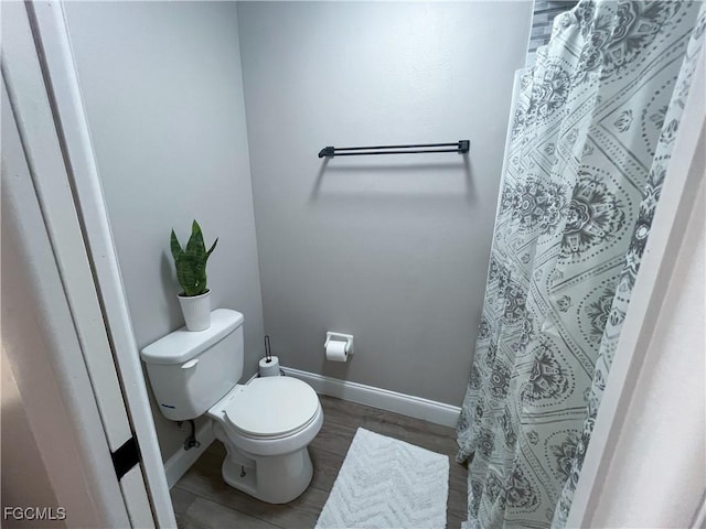 195 E Mariana Ave, North Fort Myers, FL 33917 - full bath featuring wood finished floors and curtained shower