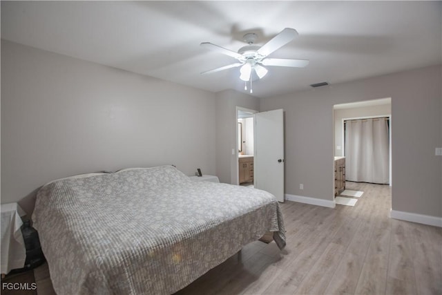195 E Mariana Ave, North Fort Myers, FL 33917 - bedroom with light wood-style floors and ceiling fan