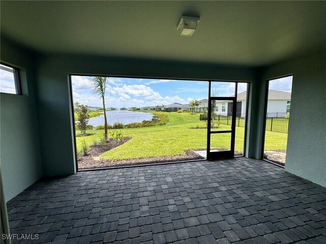16381 Preservation Blvd, Punta Gorda, FL 33982 - unfurnished sunroom featuring a water view