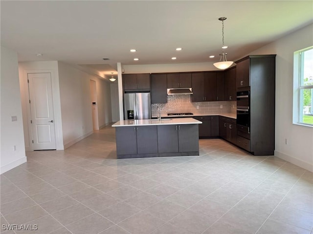 16381 Preservation Blvd, Punta Gorda, FL 33982 - kitchen featuring stainless steel refrigerator with ice dispenser, under cabinet range hood, light tile patterned floors, light countertops, and tasteful backsplash