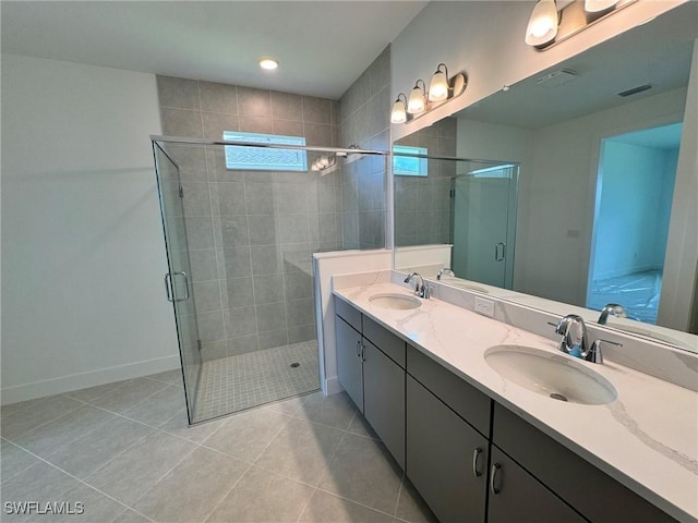 16381 Preservation Blvd, Punta Gorda, FL 33982 - full bath featuring a stall shower, double vanity, tile patterned floors, and recessed lighting