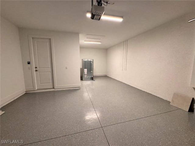 16381 Preservation Blvd, Punta Gorda, FL 33982 - garage featuring a garage door opener and baseboards