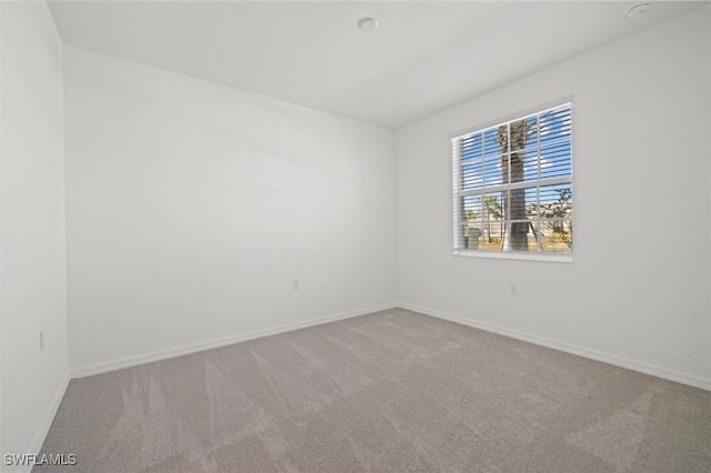 43993 Boardwalk Loop Unit 1918, Punta Gorda, FL 33982 - carpeted empty room featuring baseboards