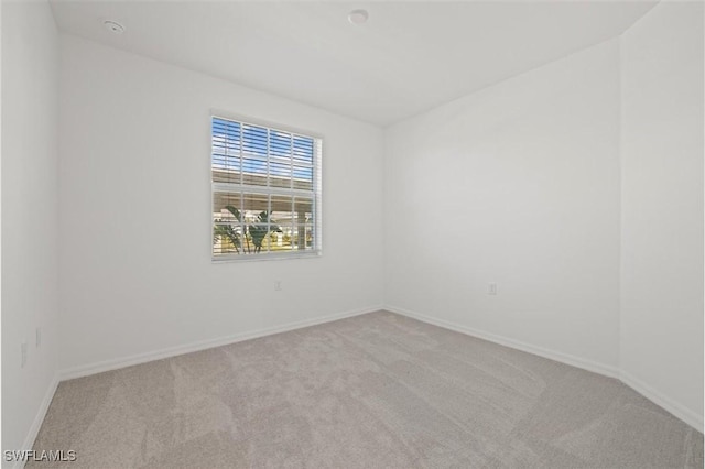 43993 Boardwalk Loop Unit 1918, Punta Gorda, FL 33982 - empty room featuring carpet floors and a smoke detector