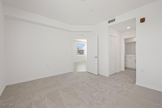 43993 Boardwalk Loop Unit 1918, Punta Gorda, FL 33982 - unfurnished bedroom with light carpet and baseboards