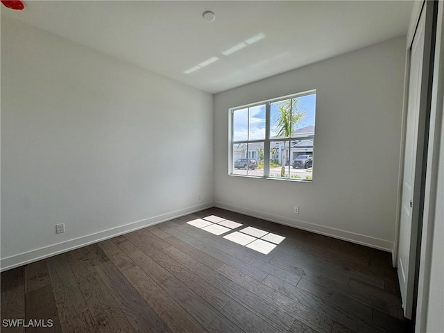 16106 Preservation Blvd, Punta Gorda, FL 33982 - unfurnished room with dark wood-style flooring and baseboards