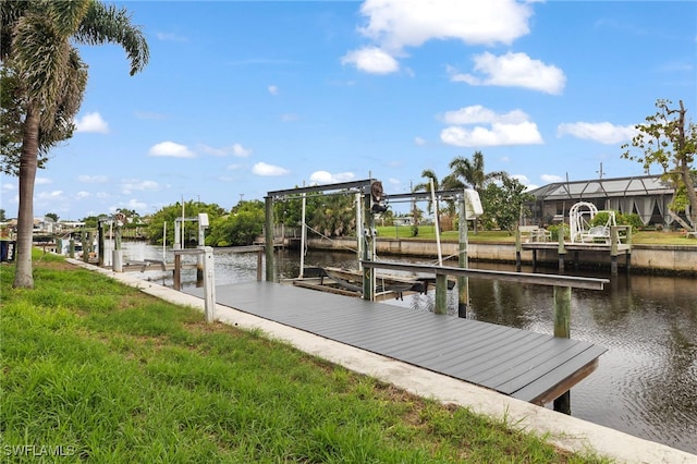 138 Dowling Ave NE, Port Charlotte, FL 33952 - dock area with boat lift and a water view