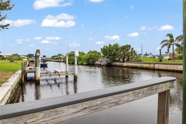 138 Dowling Ave NE, Port Charlotte, FL 33952 - dock with boat lift and a water view
