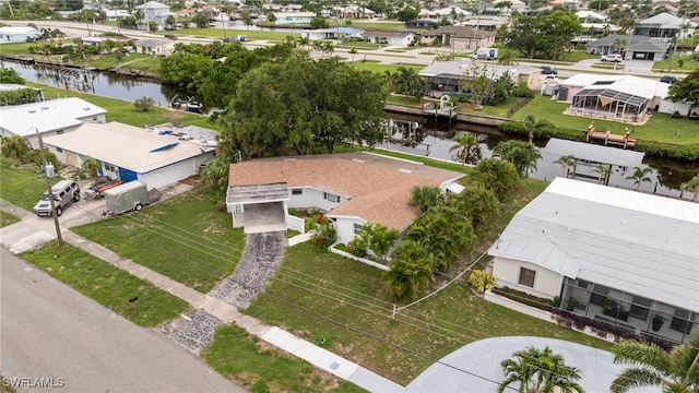 138 Dowling Ave NE, Port Charlotte, FL 33952 - aerial perspective of suburban area with a nearby body of water
