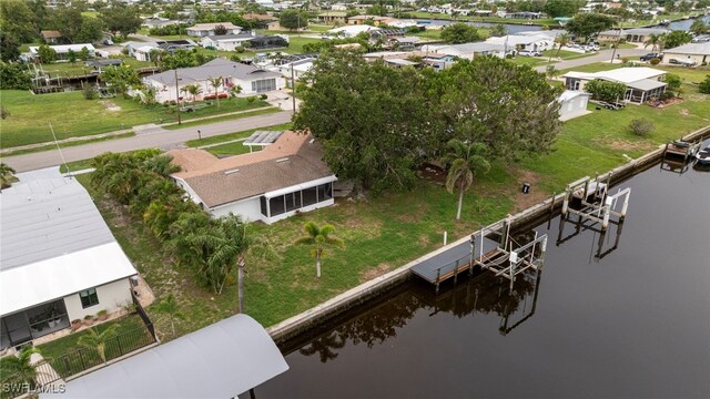 138 Dowling Ave NE, Port Charlotte, FL 33952 - aerial view of residential area featuring a large body of water