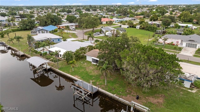 138 Dowling Ave NE, Port Charlotte, FL 33952 - aerial perspective of suburban area featuring a nearby body of water