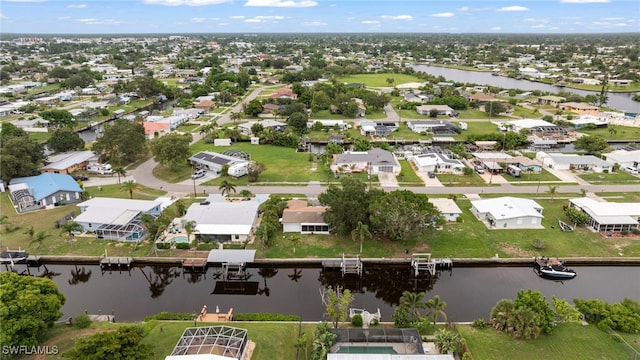 138 Dowling Ave NE, Port Charlotte, FL 33952 - aerial overview of property's location with a nearby body of water and nearby suburban area