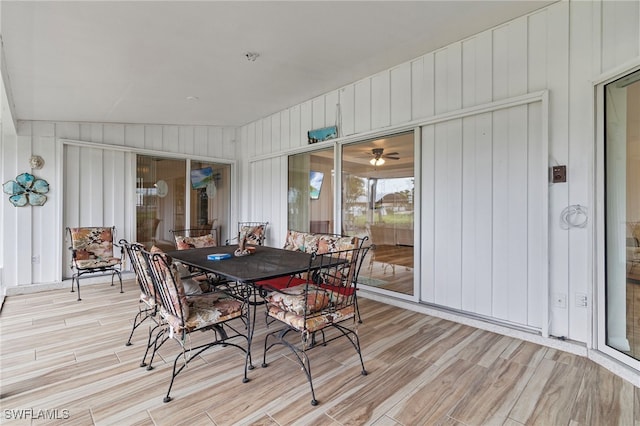 138 Dowling Ave NE, Port Charlotte, FL 33952 - sunroom / solarium featuring outdoor dining area