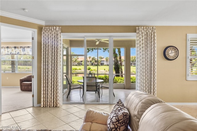 3904 Forest Glen Blvd Unit 102, Naples, FL 34114 - living room with tile patterned floors, ceiling fan, crown molding, and healthy amount of natural light