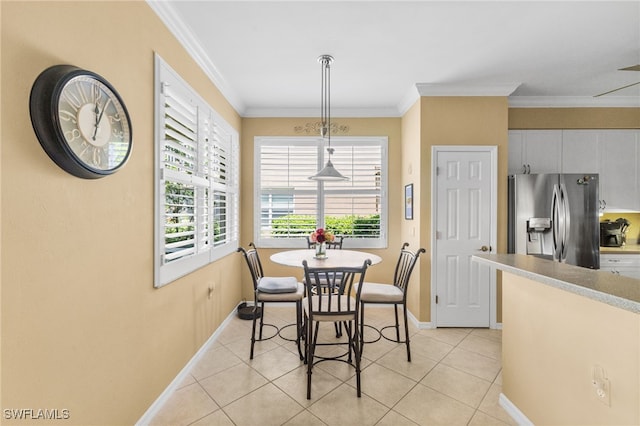 3904 Forest Glen Blvd Unit 102, Naples, FL 34114 - dining room with ornamental molding and light tile patterned floors