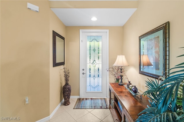 3904 Forest Glen Blvd Unit 102, Naples, FL 34114 - entrance foyer featuring light tile patterned floors and baseboards