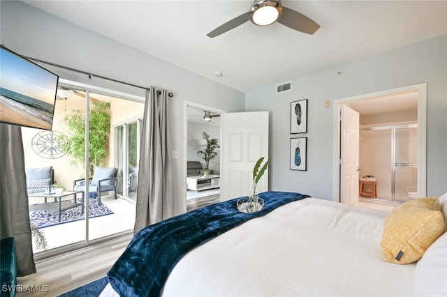 9175 Celeste Dr Unit 305, Naples, FL 34113 - bedroom featuring access to outside, wood finished floors, ensuite bathroom, and a ceiling fan