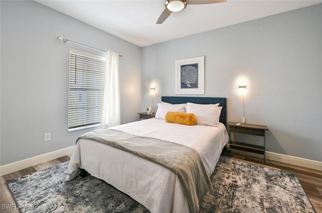 9175 Celeste Dr Unit 305, Naples, FL 34113 - bedroom featuring wood finished floors and a ceiling fan