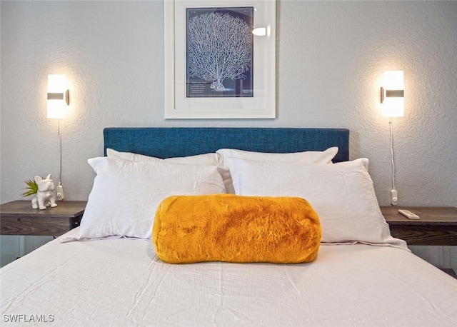 9175 Celeste Dr Unit 305, Naples, FL 34113 - bedroom with a textured wall