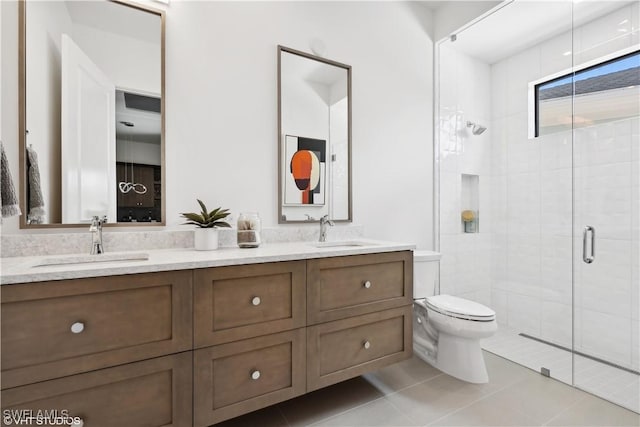 10411 Via Parma Way, Miromar Lakes, FL 33913 - bathroom featuring double vanity, a stall shower, and tile patterned floors