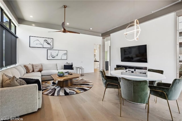 10411 Via Parma Way, Miromar Lakes, FL 33913 - living room featuring recessed lighting, wood finished floors, and a ceiling fan