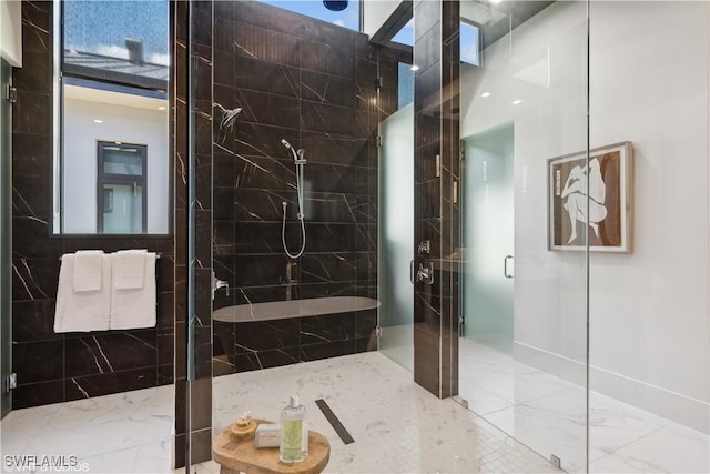 10411 Via Parma Way, Miromar Lakes, FL 33913 - bathroom with marble tiled floors and a marble finish shower