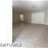 1207 Williams Ave, Lehigh Acres, FL 33972 - view of garage