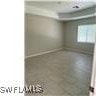 1207 Williams Ave, Lehigh Acres, FL 33972 - empty room featuring baseboards