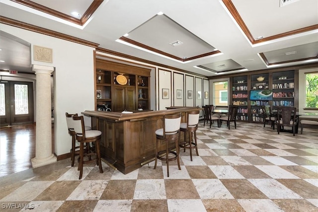 1170 Reserve Way Unit 107, Naples, FL 34105 - indoor dry bar with decorative columns and crown molding