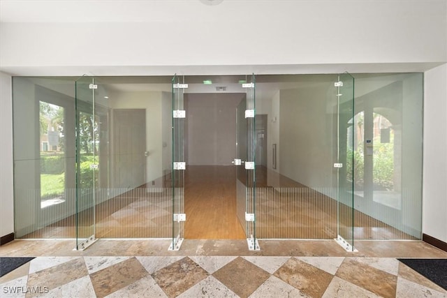 1170 Reserve Way Unit 107, Naples, FL 34105 - bathroom featuring baseboards