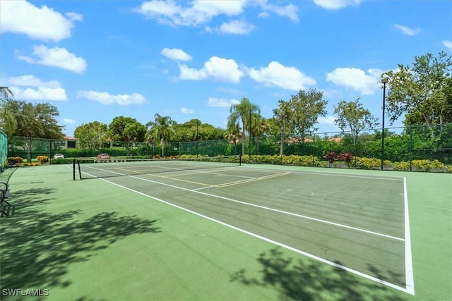 1170 Reserve Way Unit 107, Naples, FL 34105 - view of tennis court with community basketball court
