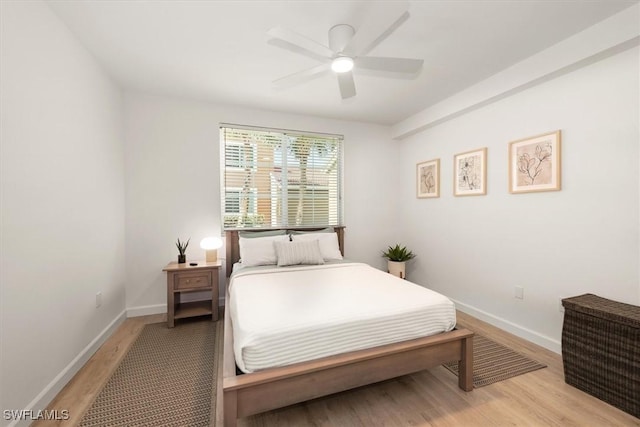 1170 Reserve Way Unit 107, Naples, FL 34105 - bedroom featuring light wood-style floors and a ceiling fan