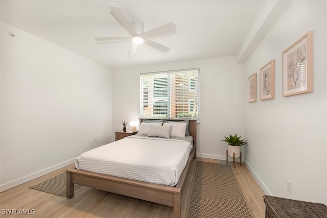 1170 Reserve Way Unit 107, Naples, FL 34105 - bedroom featuring light wood finished floors and ceiling fan